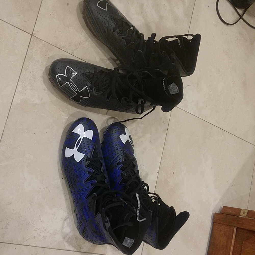 Under armour cleats both sets of shoes come togeth